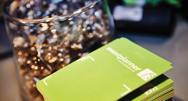 Event badges at registration desk at event.